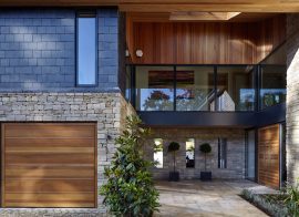How to attach decorative stone slabs to a garage wall.